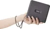 A hand holding a gray Fujifilm Instax LINK WIDE printer with a wrist strap attached. Produktbild-Vorschau