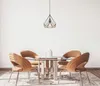 A dining set with a pendant light above it. Produktbild-Vorschau