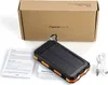 A solar power bank is displayed with its packaging and accessories on a white background. Produktbild-Vorschau