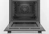 An open oven with the interior visible. Produktbild-Vorschau