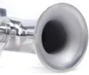 A close-up of a stainless steel juicer attachment. Produktbild-Vorschau