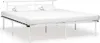 A white metal bed frame with a mattress and two pillows. Produktbild-Vorschau