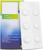 A blister pack of white coffee oil remover tablets next to its product packaging. Produktbild-Vorschau