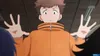 A young man in an orange jacket with black stripes is shown from the chest up, with his hands held up in front of him, as if presenting something. Two other people are partially visible on either side of him. Produktbild-Vorschau
