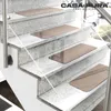 Staircase with beige stair mats. Anteprima dell’immagine prodotto