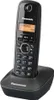 A black Panasonic cordless phone sits in its charging base against a white background. Podgląd zdjęcia produktu