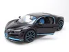 A black Bugatti Chiron model car with blue accents, displayed on a white background. Voir les images du produit