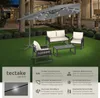 An outdoor patio set with a large umbrella, sofa, chairs, and coffee table, set up on a lawn at dusk. Náhled obrázku produktu