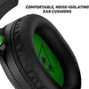 A close-up of a black gaming headset ear cup with green accents, highlighting the ear cushion. Anteprima dell’immagine prodotto