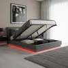 A bedroom scene with a bed open to reveal storage space, illuminated by LED lights. Produktbild-Vorschau