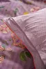 A close-up of a floral patterned duvet cover and pillowcase. Produktbild-Vorschau