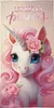 A close-up illustration of a unicorn with pink mane and flowers, with text overlay. Anteprima dell’immagine prodotto