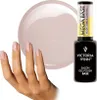 A hand with manicured nails is shown next to a bottle of nail polish and a large droplet of the polish. Náhled obrázku produktu
