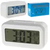 Three digital alarm clocks are displayed, one in its packaging. Náhled obrázku produktu
