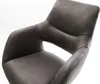 A close-up view of a dark gray upholstered chair. Produktbild-Vorschau