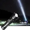 A person is using a powerful LED flashlight in a dark, outdoor setting with a starry sky. Anteprima dell’immagine prodotto
