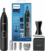 A product shot of a Philips nose trimmer and its accessories, presented in its packaging. Podgląd zdjęcia produktu