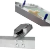 Close-up views of a metal revision door mechanism and mounting hardware. Voir les images du produit