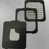 Three different cutting grids for a food chopper are stacked on a light gray surface. Náhled obrázku produktu