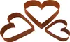 Three heart-shaped garden edging pieces are arranged on a white background. Produktbild-Vorschau