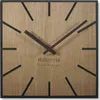 A square wooden wall clock with black hands and hour markers. Náhled obrázku produktu