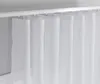 A close-up view of white sheer curtains hanging from a track. Produktbild-Vorschau