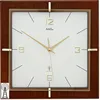 A square wall clock with a wooden frame and a white face. Produktbild-Vorschau