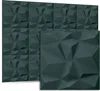 A set of dark gray 3D wall panels with a geometric, faceted design, shown from a slightly angled perspective. Produktbild-Vorschau