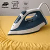 An iron is shown on a yellow fabric, likely a bedsheet, with some text and icons in the upper left corner. Produktbild-Vorschau