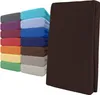 A stack of colorful fitted sheets and a single brown fitted sheet folded. Produktbild-Vorschau