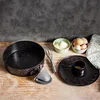 Baking ingredients and equipment are arranged on a wooden surface against a textured gray background. Anteprima dell’immagine prodotto