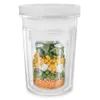 A clear, studio shot of a transparent food storage container filled with layers of different food items. Produktbild-Vorschau