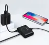 A black USB hub is connected to a phone and a power adapter, demonstrating its charging and connectivity capabilities. Náhled obrázku produktu