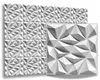 A display of white 3D wall panels with a geometric, faceted design. One panel is shown in close-up to the right of a larger arrangement of panels. Náhled obrázku produktu