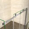 A close-up view of a shower enclosure's sliding door mechanism against a tiled wall. Produktbild-Vorschau