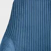 A close-up view of the textured fabric of a blue chair. Produktbild-Vorschau