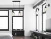 A modern bedroom or living room with white brick walls, large windows, and a bed. The focus is on the lighting fixtures. Náhled obrázku produktu
