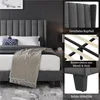 A bedroom scene featuring a bed, with close-up shots of the bed frame's details. Produktbild-Vorschau