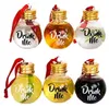 Six small glass bottles with gold lids and red ribbons, each labeled 'Drink Me', filled with different colored liquids. Anteprima dell’immagine prodotto