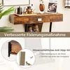 A console table with drawers and shelves, mounted on a wall, with decorative items on top. The lower part of the image shows a diagram illustrating an anti-tip kit. Anteprima dell’immagine prodotto