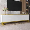 A modern living room with a TV stand, TV, and decorative items. Náhľad obrázku produktu