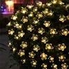 Lampes solaires de jardin fleuries 7m 50LED blanc chaud Voir les images du produit 6