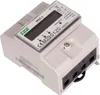 A close-up, angled view of a white and gray three-phase energy meter with a digital display and connection terminals. Produktbild-Vorschau