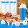 A blue slushy cup with a white lid and straw, surrounded by fresh fruit and product detail callouts. Podgląd zdjęcia produktu