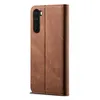 A brown flip-style phone case for a OnePlus Nord is shown against a white background. Produktbild-Vorschau