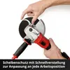 A person's hands are shown adjusting the protective guard on an angle grinder. Produktbild-Vorschau