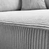 A close-up view of the textured fabric of a sofa, showing the ribbed pattern and stitching. Produktbild-Vorschau