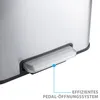 Close-up of a silver pedal-operated trash can with a dotted line pointing to the pedal and text indicating its function. Podgląd zdjęcia produktu