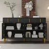 A black sideboard with gold handles is displayed in a room with decorative items on top and inside. Anteprima dell’immagine prodotto