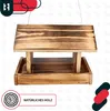 A wooden bird feeder is shown against a light gray background with a repeating pattern. There are logos and text overlays in the corners. Produktbild-Vorschau